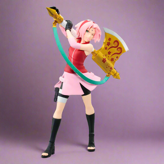 Action figure with pink hair and a red outfit holding a weapon and shield on a purple background