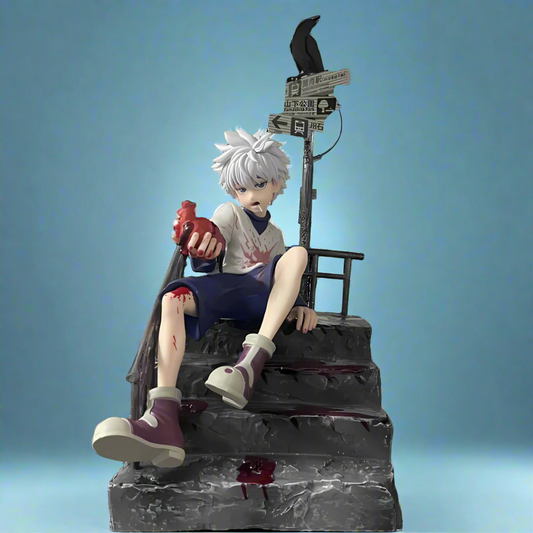Anime character figurine sitting on steps with a blue background