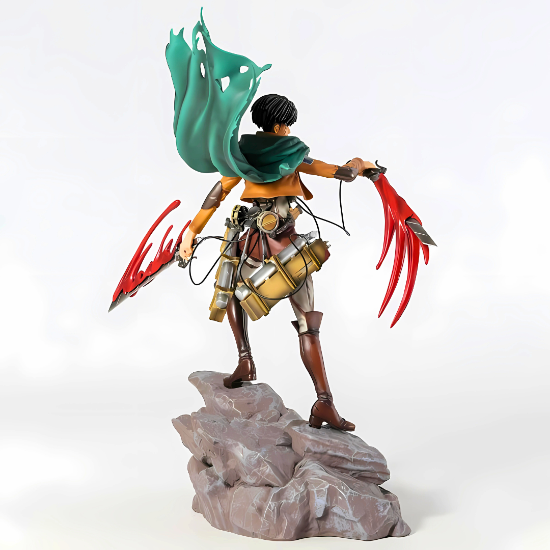 Figurine of a character with red claws and green cape on a rock, white background