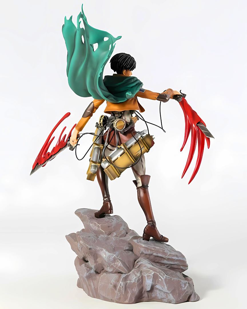 Figurine of a character with red claws and green cape on a rock, white background