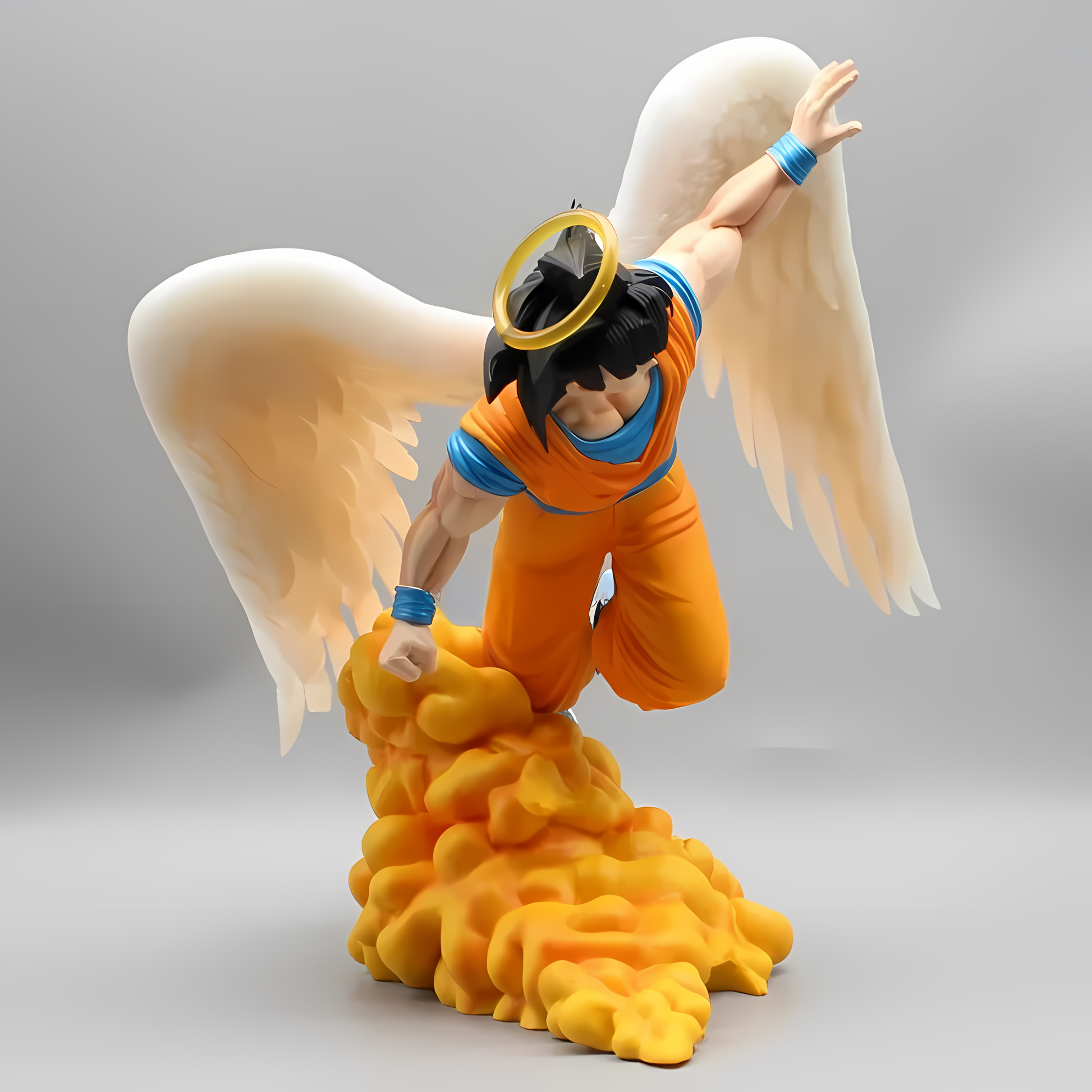 The 'Raising from Heaven Goku' figure features the iconic Dragon Ball character Goku as an angel with a halo above his head and large, feathered wings. He's in a dynamic pose, with one fist grounded on a plume of golden clouds, symbolizing ascension or divine intervention. Goku’s determined facial expression and his classic orange and blue outfit add to the dramatic representation.
