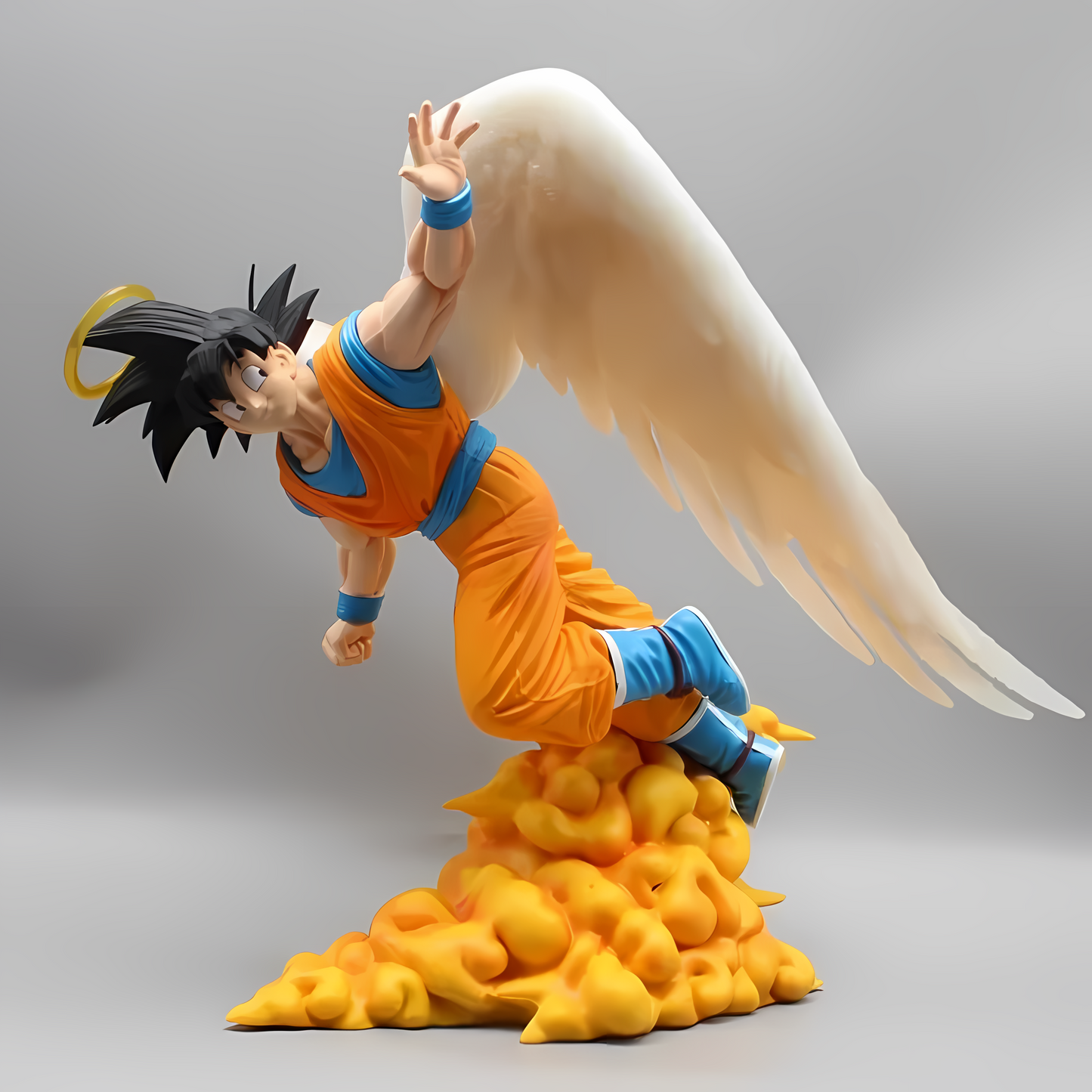 The 'Raising from Heaven Goku' collectible figure is a unique portrayal of Goku from Dragon Ball, kneeling on a soft cloud base, with a serene expression and one hand reaching skyward. He features large, white, feathered wings and is dressed in his signature orange and blue fighting gi, creating a blend of his warrior essence with a celestial theme.