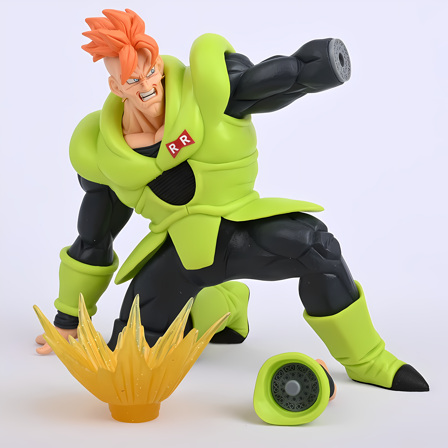 The Dragon Ball figure of Android 16 in a fighting stance, sporting his iconic green and black outfit with the Red Ribbon Army logo, captured against a plain background.