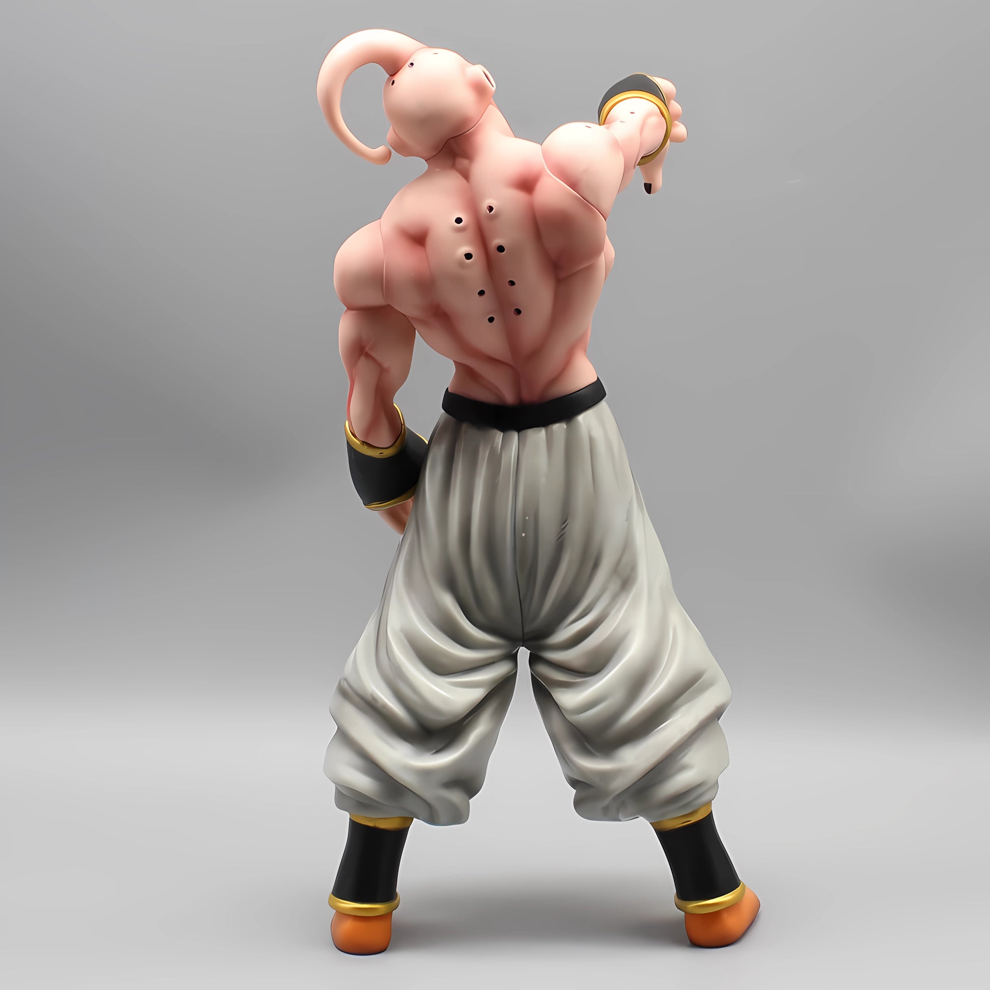 Rear view of the 'Malevolent Majin Buu' collectible, capturing the back muscles and pants' drapery, reflecting the character's strength and design details.
