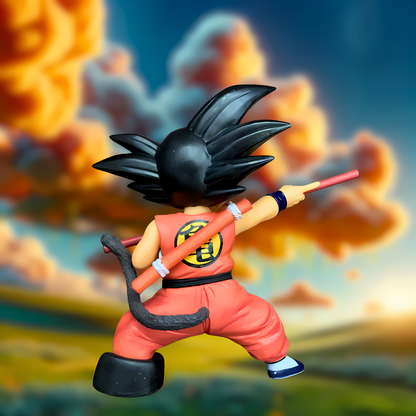 Back view of the young Goku collectible figure from Dragon Ball, showcasing the 'Turtle School' uniform and Power Pole, against a vivid sky and fire, highlighting the origins of the Dragon Ball saga.