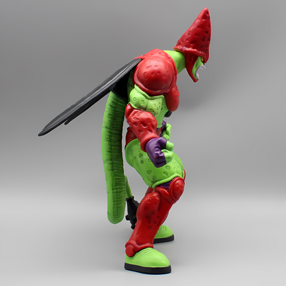 Side angle of the Dragon Ball 'Cell Max' collectible figure, emphasizing the character's red wing and spotted green skin texture.