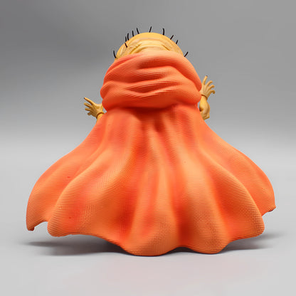 The back of the Dragon Ball figure of Babidi, showcasing the flow of his orange robe and the texture of his head, adding depth to Dragon Ball collectible displays.