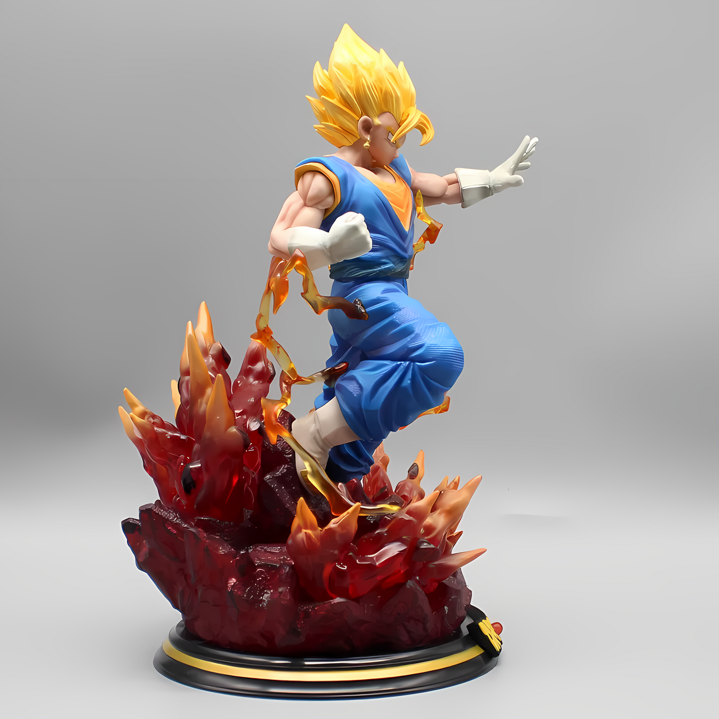 Side angle of the Dragon Ball Vegetto statue, his blonde hair spiked upwards, illustrating his power as he stands on a base that appears to erupt with lava-like flames.