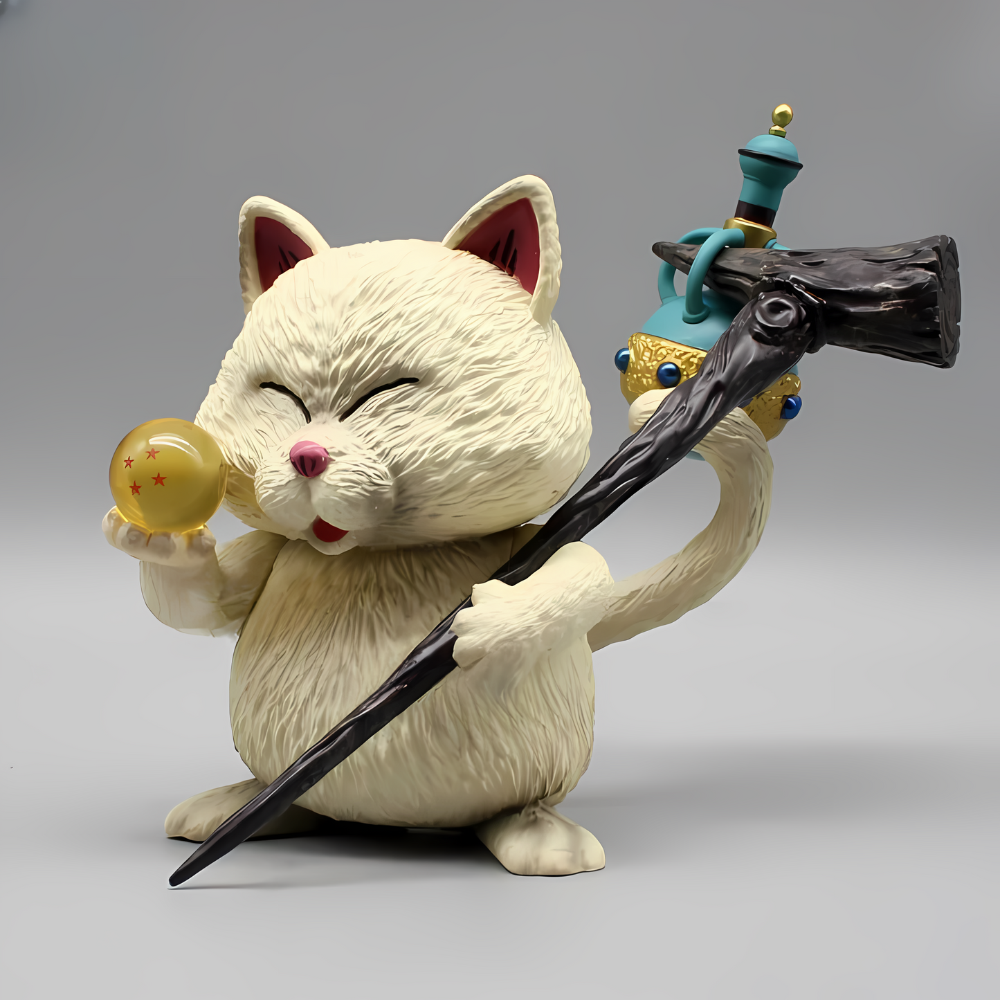 A full-frontal view of the 'Guardian's Wisdom Karin' collectible figure, with the cat's joyous expression as he examines a Dragon Ball, capturing a moment of delight.