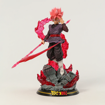 The Black Goku Rises Dragon Ball collectible figure features the character in Super Saiyan Rose form with pink hair and wielding a radiant energy sword. Poised on a base of rubble and fierce red energy accents, the figure's poised stance and martial outfit are highlighted, complemented by the DRAGON BALL logo on the circular base.