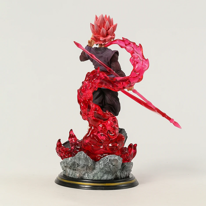 The Dragon Ball collectible figure 'Black Goku Rises' depicts Goku Black in Super Saiyan Rose form, brandishing an energy scythe with a swirl of red energy around him. The dynamic pose, detailed costume, and the intense swirl of energy showcase the character's power and elegance, with the DRAGON BALL logo on the base affirming its authenticity as a prized piece for collectors.