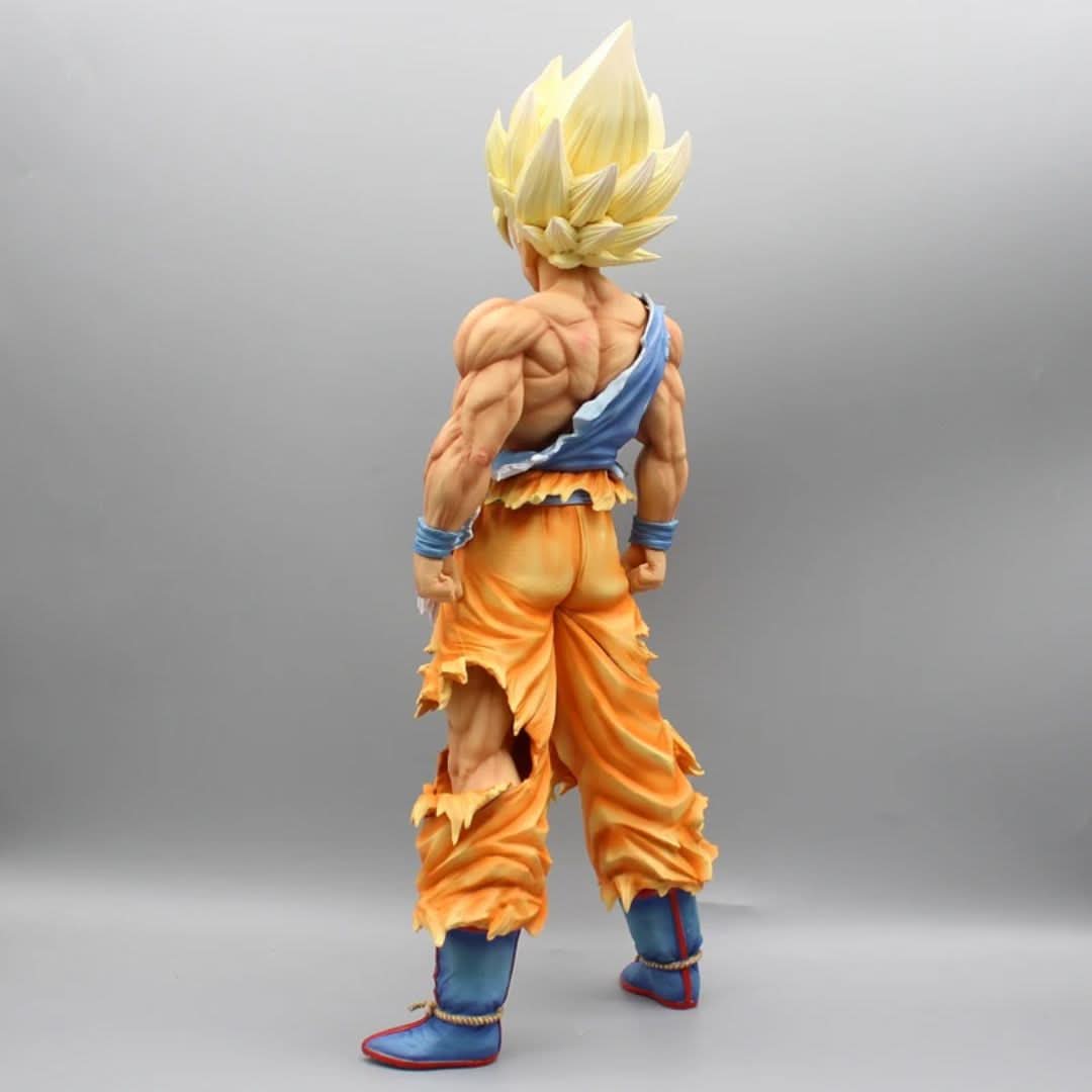 Back view of Goku Super Saiyan figure – showcasing sculpted golden hair and detailed clothing.
