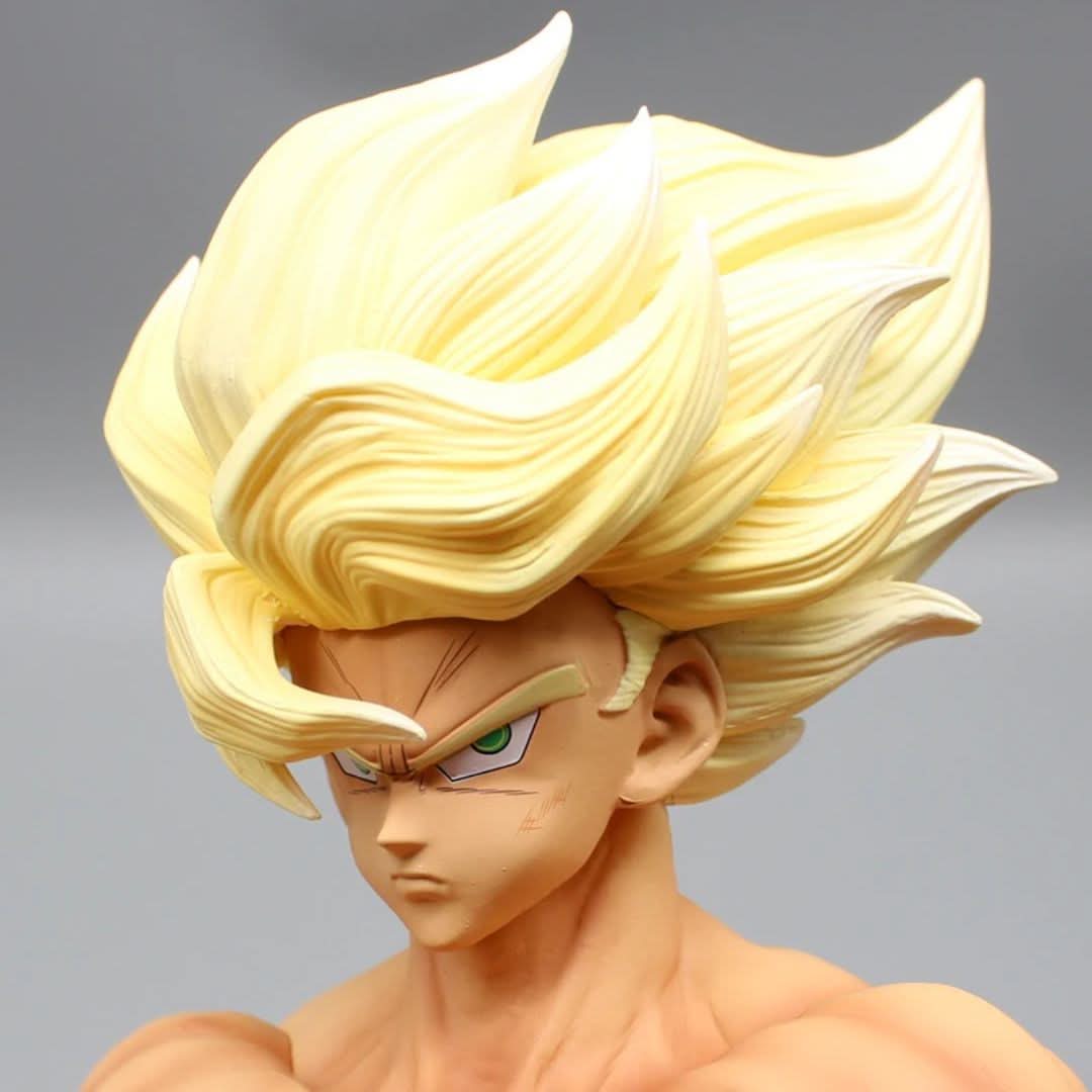 Close-up of Goku's face in Super Saiyan form – intense expression and spiky golden hair.