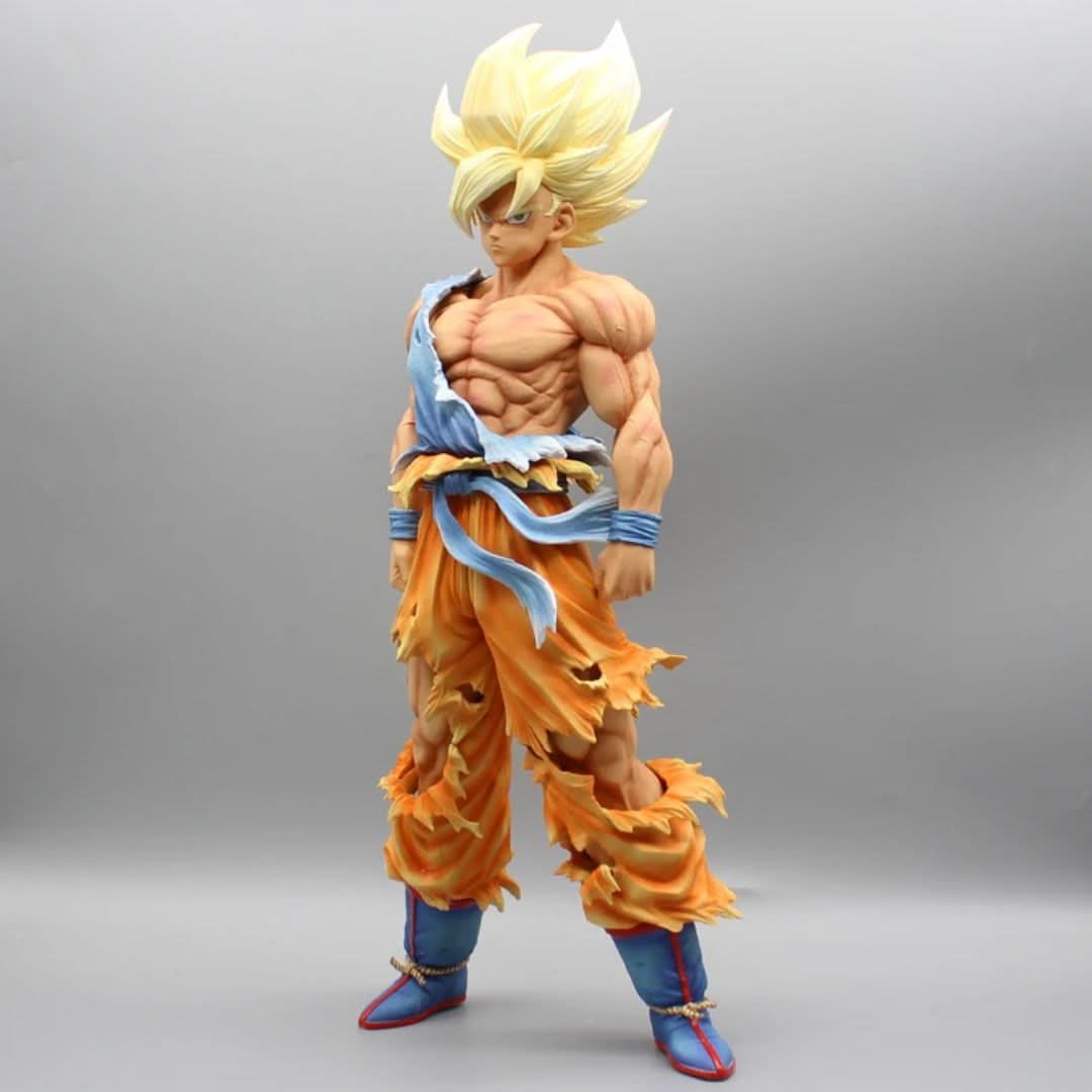 Goku Super Saiyan anime figure – left side angle showing muscle definition and torn outfit.