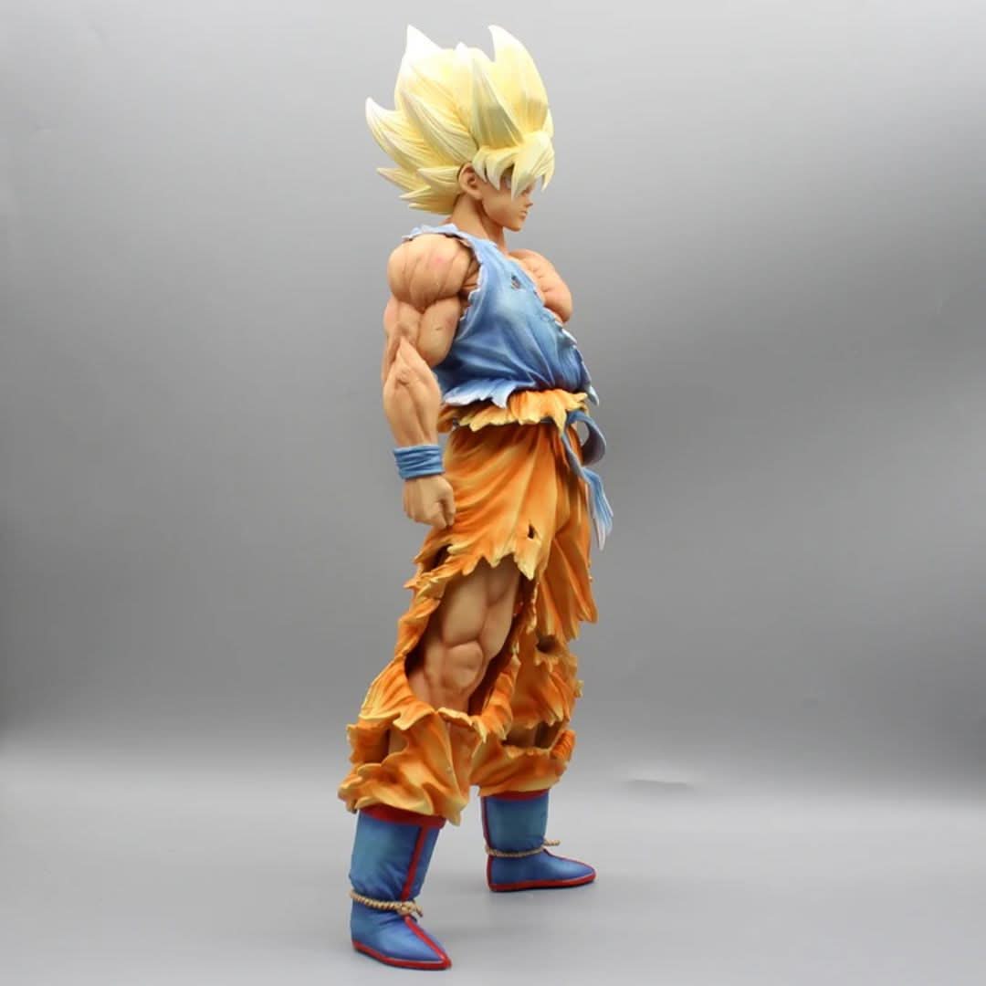  Goku Super Saiyan anime figure – left side angle showing muscle definition and torn outfit.