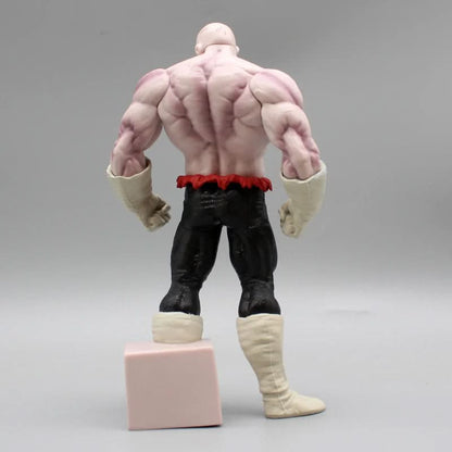 Back view of a Jiren figure from Dragon Ball with a beige block behind the legs, showing detailed sculpting.