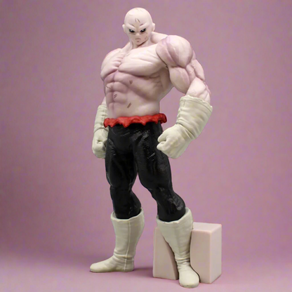 Front view of a Jiren Dragon Ball figure showcasing muscular sculpt, white gloves, and boots on a pink background.