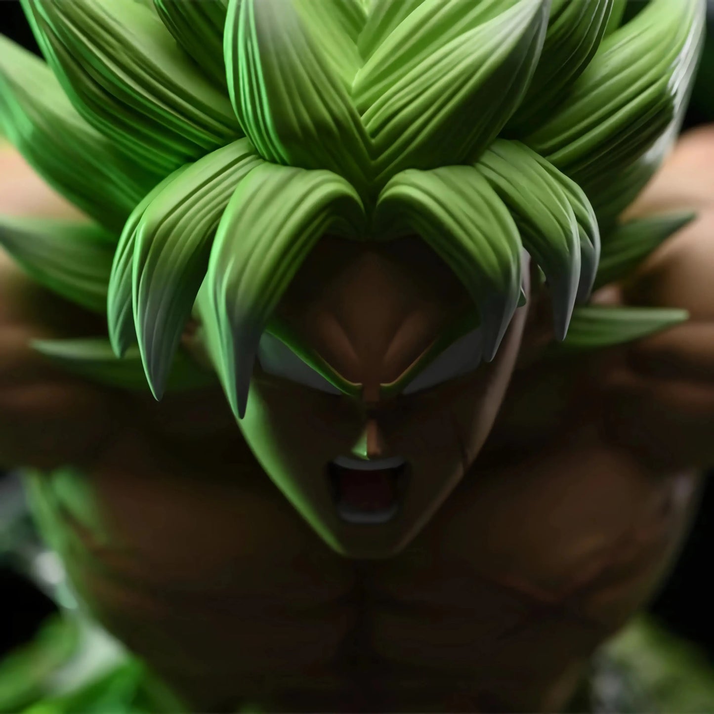 Close-up view of the Dragon Ball figure Broly's fierce expression, emphasizing his green hair and the intense details of his muscular build.