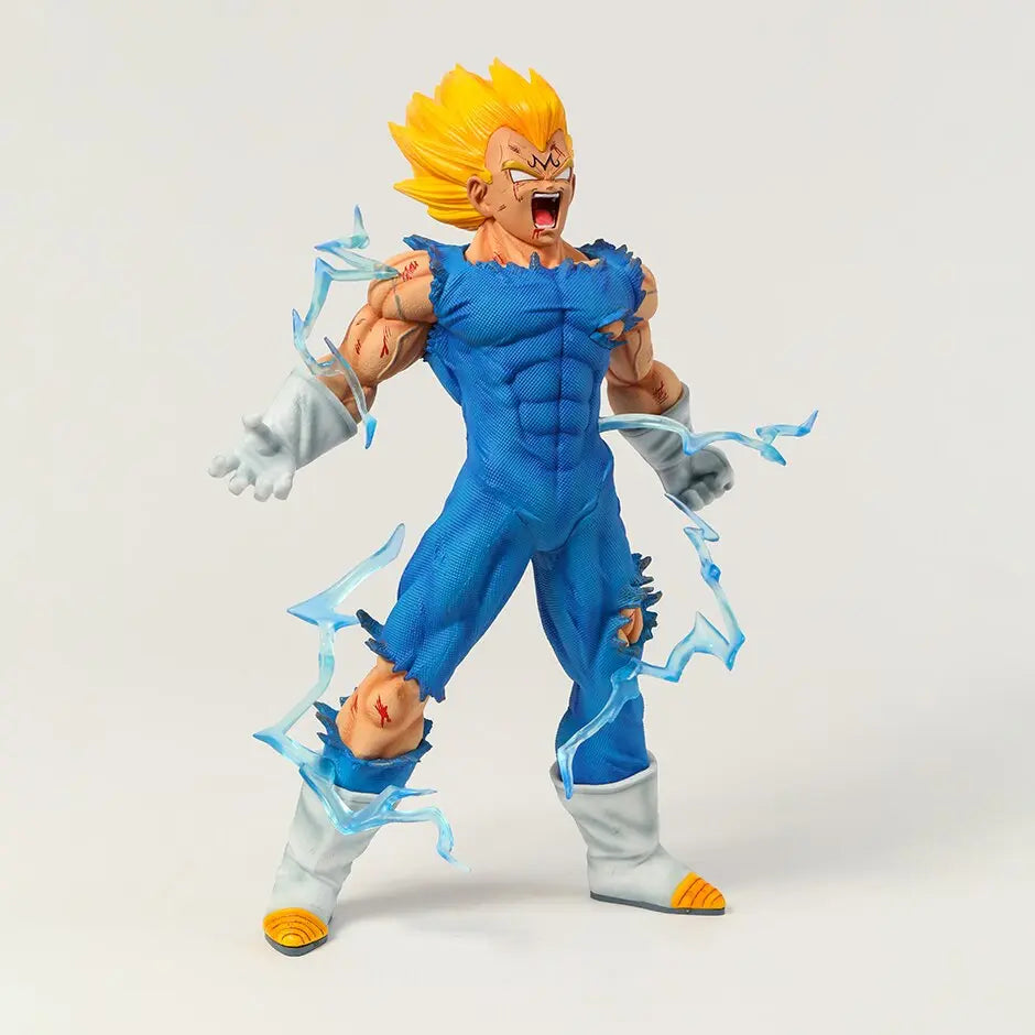 Dragon Ball Z collectible figure of Majin Vegeta in mid-roar with his golden Super Saiyan mane, surrounded by jagged blue energy effects, showcasing his torn uniform and fierce battle spirit, a powerful portrayal of the Saiyan Prince's might.