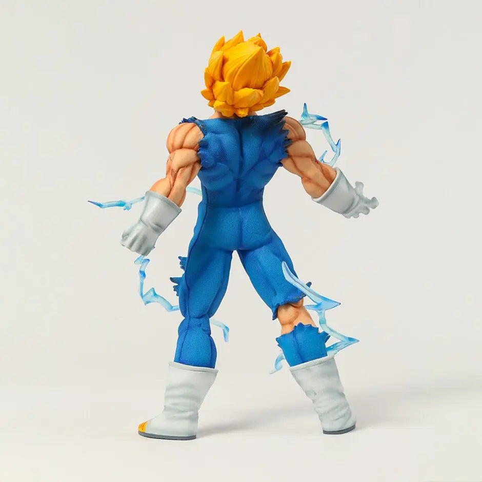 Rear view of a Majin Vegeta figurine from Dragon Ball Z, displaying his torn blue battle suit and muscular build, with his Super Saiyan hair radiating power and energy effects swirling around him, epitomizing his fierce fighting spirit.