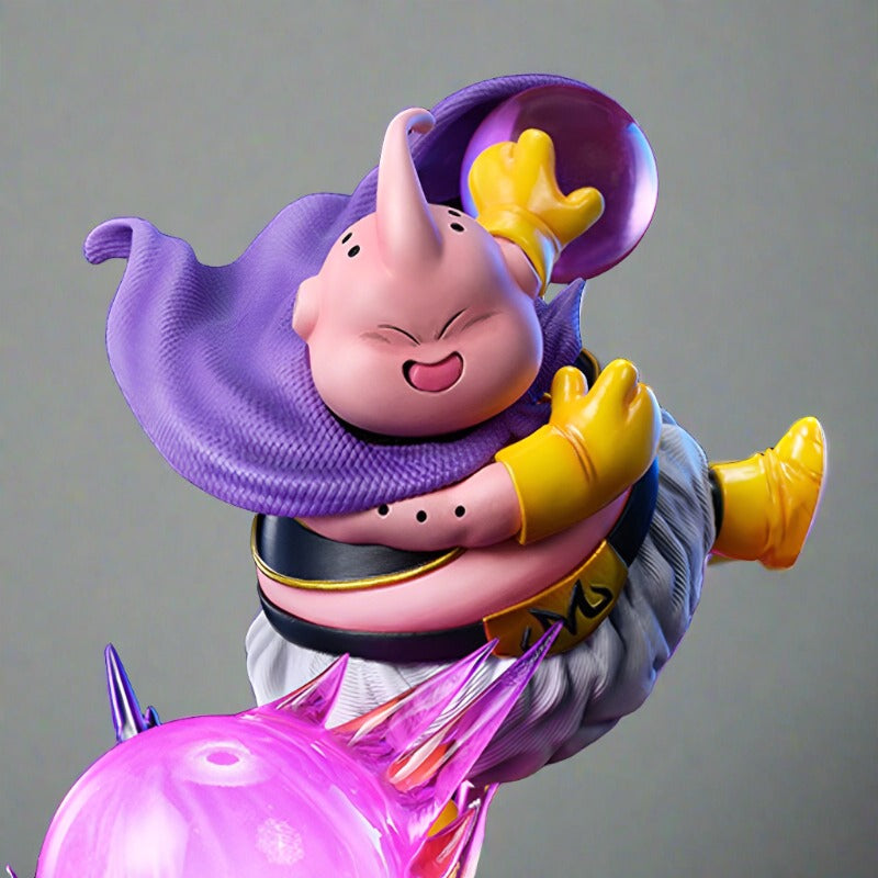 Close-up of Majin Buu's cheerful expression as he executes an energy attack, captured in a Dragon Ball Z figure with intense magenta energy effects on a shadowy background.