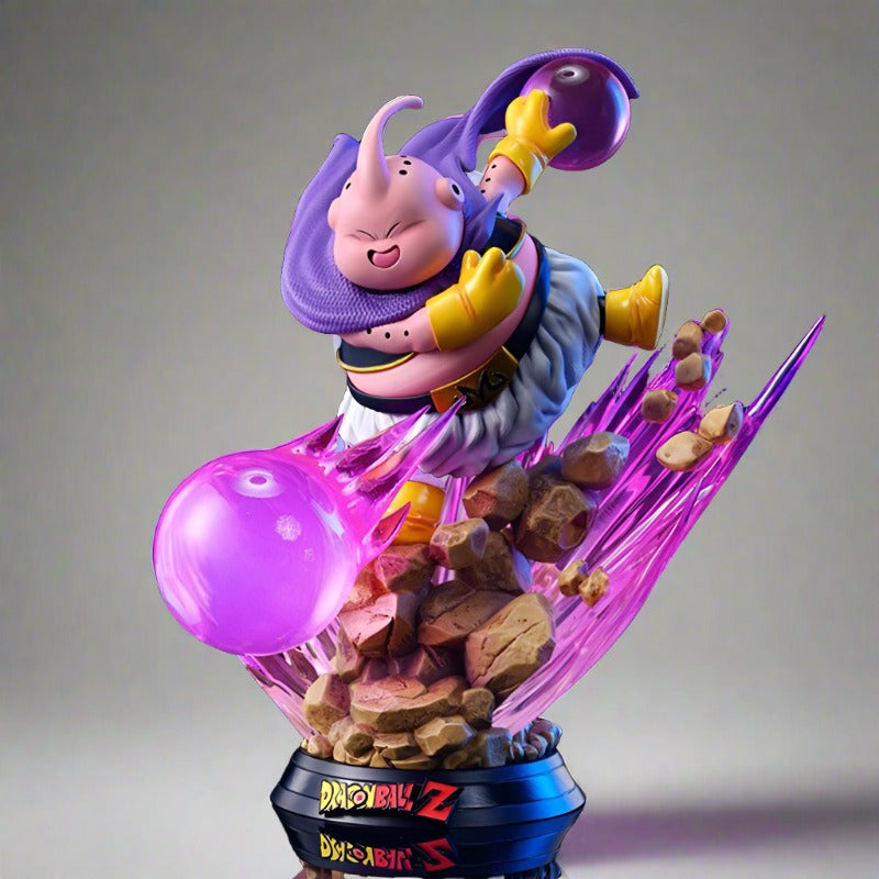 Collectible statue of Majin Buu from Dragon Ball Z with a mischievous grin, performing an energy attack, surrounded by sharp magenta energy crystals on a dark background.