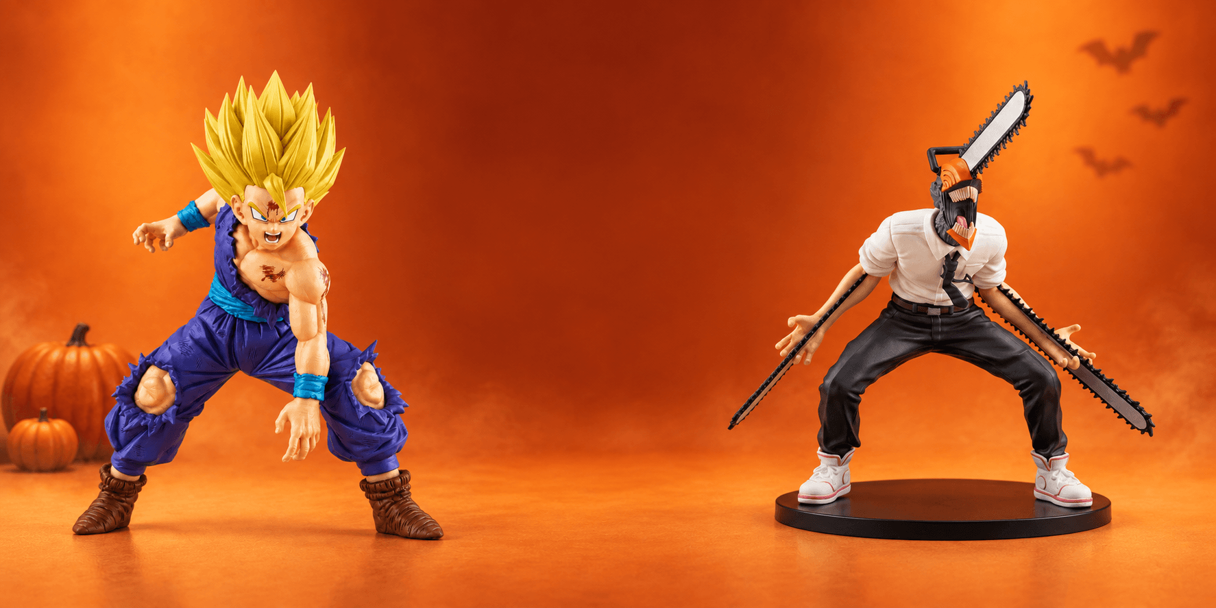 Gohan and Chainsaw Man collectible figures in a Halloween studio display